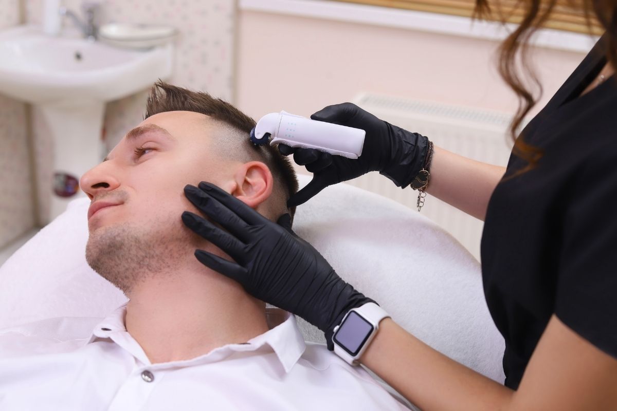 Man getting Micro Needling for hair at Skin by Tatum in Miami